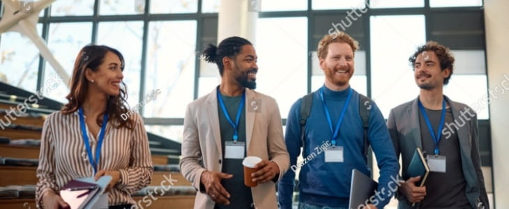 Four business people at a convention